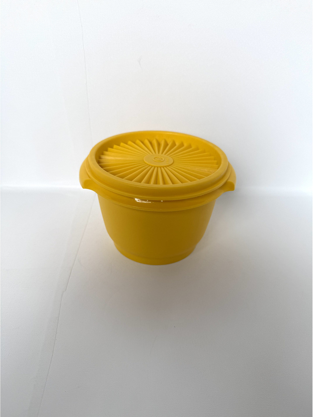 Vintage Tupperware Yellow Container with Unique Sunburst Lid